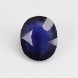 A 10.31ct oval mixed-cut sapphire, dimensions: 14.57mm x 12.23mm x 5.91mm, evidence of dying, 2.07g,