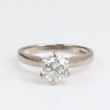 A modern 18ct white gold 1.2ct solitaire diamond ring, plain 6-claw cage setting with modern round