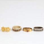 A group of scarf rings, including 15ct gold example, 4.2g (4) No damage or repair, settings