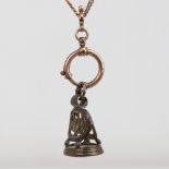 An Antique gold plated fancy link Albert chain, with intaglio carved seal, dog clip and spring clip,