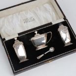 A George V Art Deco 3-piece silver cruet set, comprising mustard pot, salt and pepper, by William