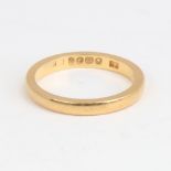 An early 20th century 22ct gold wedding band ring, makers marks HS, hallmarks Birmingham 1931,