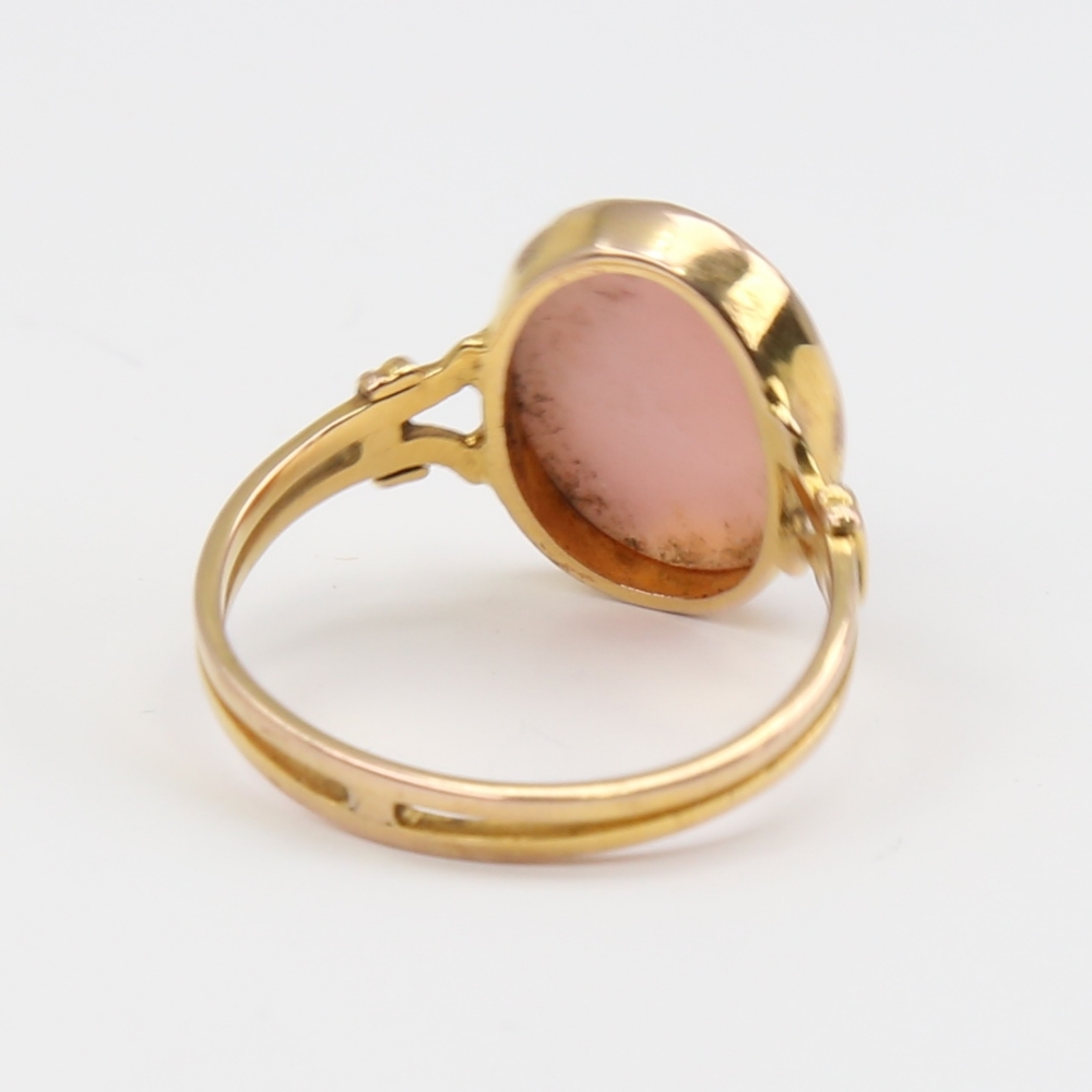 An unmarked gold relief carved pink coral cameo ring, depicting female profile, setting height 16mm, - Image 4 of 5