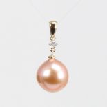 A modern 14ct gold whole Southsea pearl and diamond drop pendant, set with 0.05ct round brilliant-