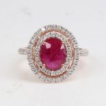 A modern 14ct rose gold ruby and diamond cluster double-halo ring, set with oval mixed-cut ruby