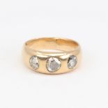 An Antique unmarked gold 3-stone rose-cut diamond gypsy ring, central diamond approximate