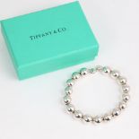 TIFFANY & CO - a modern sterling silver bead bracelet, bracelet length 18cm, 18.2g, boxed with