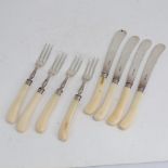 An Edwardian set of silver-bladed ivory-handled pistol-grip dessert knives and forks, for 4