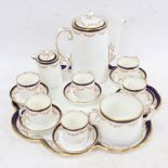 Aynsley porcelain cabaret set, with swag decoration, on matching tray with shaped edge