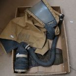 A Second World War Period babies gas mask, dated May 1943