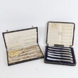 A cased set of silver-handled pistol grip butter knives, and a set of unmarked gilt white metal