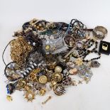 A large quantity of mixed costume jewellery, brooches etc