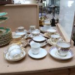 A collection of 19th century and other porcelain cups and saucers, including Derby, and Copeland and