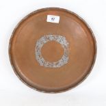 An Arts and Crafts hammered copper tray, by Hugh Wallis, diameter 28cm