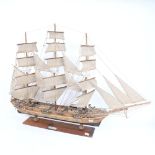 A handmade model frigate warship, with 18lb guns, on wood stand, overall length 82cm, overall height