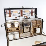A 1930s motor car travelling picnic set for 4 people, by G W Scott & Sons for Coracle, with original