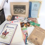 A box of ephemera, including Civil Defence Manual Basic Training, tin can craft etc