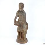 A large and heavy cast-iron figural sculpture, lady carrying grapes, unsigned, height 67cm