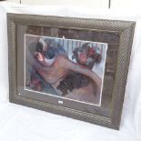 A large modern colour print, reclining figure, silvered rope twist style frame, overall frame