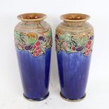 A pair of Royal Doulton blue glazed stoneware vases, grapevine decoration, impressed stamp "X8721D