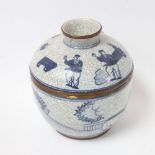 A Chinese blue and white crackle glaze jar and cover, with brass mounts, height 15cm