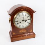 An early 20th century satinwood inlaid stained oak dome-top 8-day mantel clock, dial by Wootton of