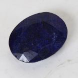 A 448ct unmounted oval mixed-cut sapphire, dimensions: 50.00mm x 38.00mm x 21.00mm, evidence of