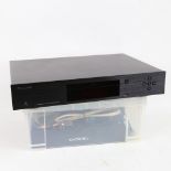 OPPO - a 4K Ultra HD Blu-Ray disc player, model UDP-203, with remote cables and instruction booklet,