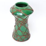 A Japanese Kyoto Awaji Ware green glaze pottery vase, with rattan/wicker basket weave mount,