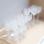 A group of crystal drinking glasses, including wine and Sherry