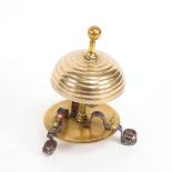 Vintage brass and copper desk bell, on scrolled feet, height 13.5cm