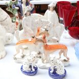 A reproduction Staffordshire flat-back figure, 2 pairs of Staffordshire style dogs etc
