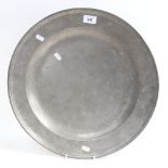 A pewter charger with touch marks, 45cm