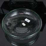 A large handmade green moulded glass bowl/lens?, diameter 26cm