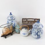 A Chinese porcelain Bonsai dish, a pair of jars and covers, a carved wood box with carrying