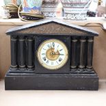 A large 19th century slate-cased architectural 8-day mantel clock, enamel dial with Roman numeral