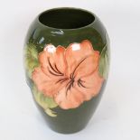 A Moorcroft Hibiscus pattern vase, height 18cm
