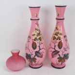 A pair of hand painted pink milk glass vases, and a small squat vase, largest height 36cm (3)