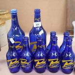 A group of Vintage Babycham bottles, all empty