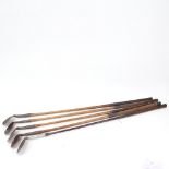 5 Vintage wooden-shafted golf club irons