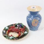A Portuguese Majolica wall plaque, with crab and mussels design, and an Art pottery vase, signed
