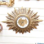 A Vintage sunburst wall clock, 54cm across