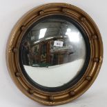 A Vintage circular gilt-framed convex mirror, 41cm