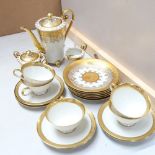 A German Heinrich porcelain coffee service, with matching plates