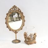 A mirror on stand, with cast and pierced gilt-metal frame, 45cm, and a glass vase, in a