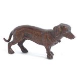 A miniature patinated bronze Dachshund dog, length 11cm