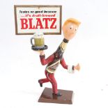 A Vintage painted metal advertising bar figure, and separate sign, for Milwaukee Blatz Beer,