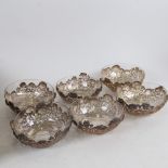 A set of 6 Chinese export silver and clear glass bowls, by Wang Hing, circular form with relief