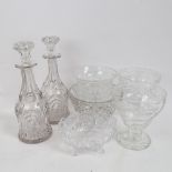 A group of cut-glass bowls, decanters and stoppers etc