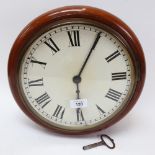 A Vintage mahogany circular dial wall clock, dial diameter 24cm, with pendulum and key